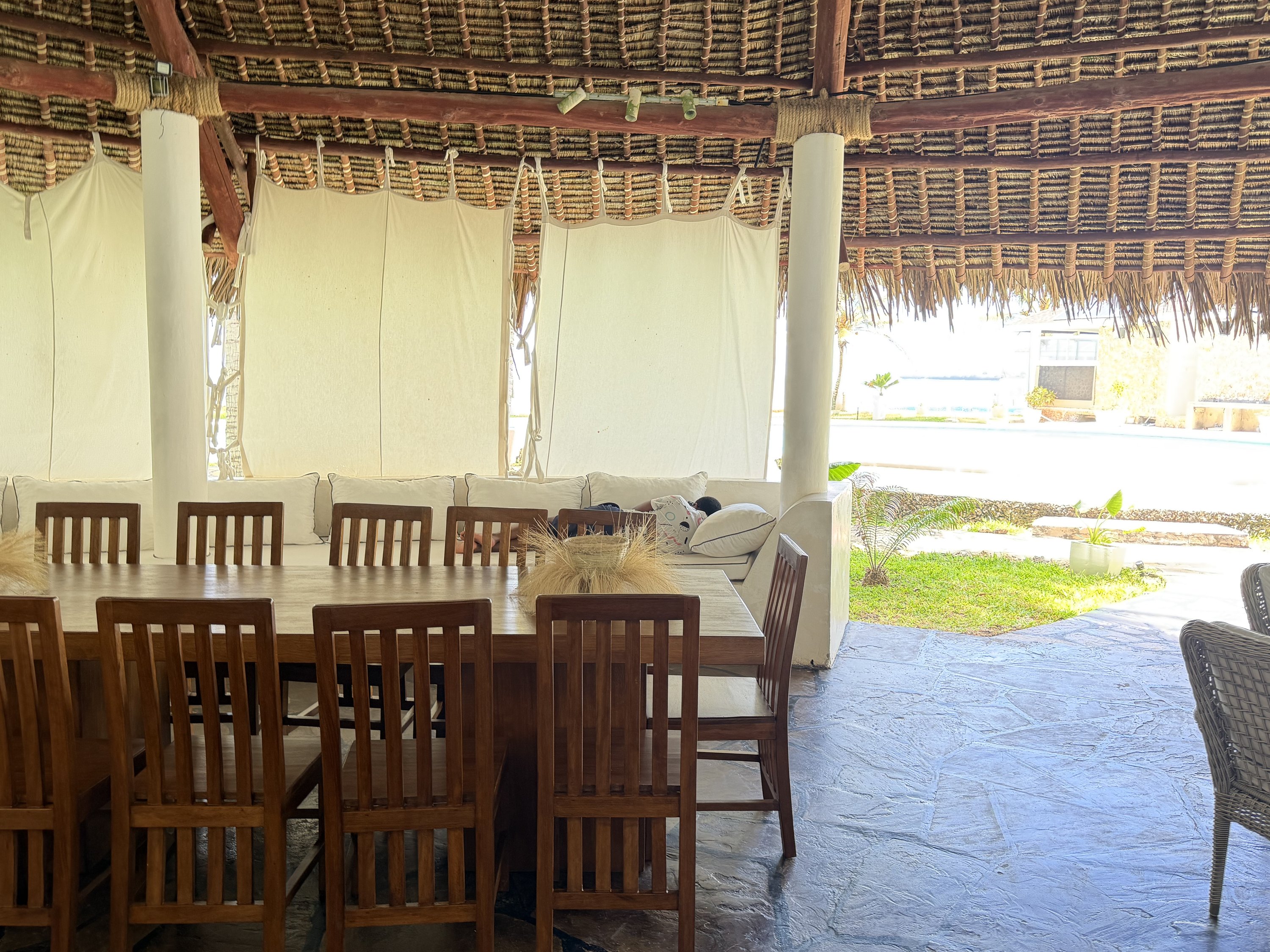 Open-air dining pavilion facing the ocean